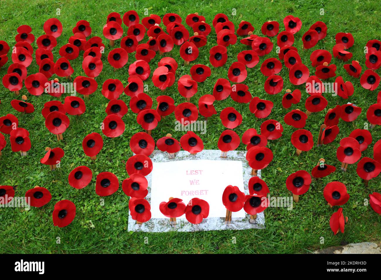 Remembrance poppies outside Cartmel priory, Cumbria, England, UK. Stock Photo