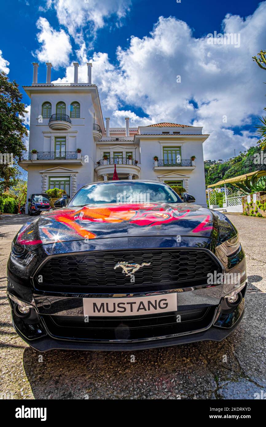 Ford Mustang car photographed in front of a luyxurious Villa in Sorrento, Italy Stock Photo