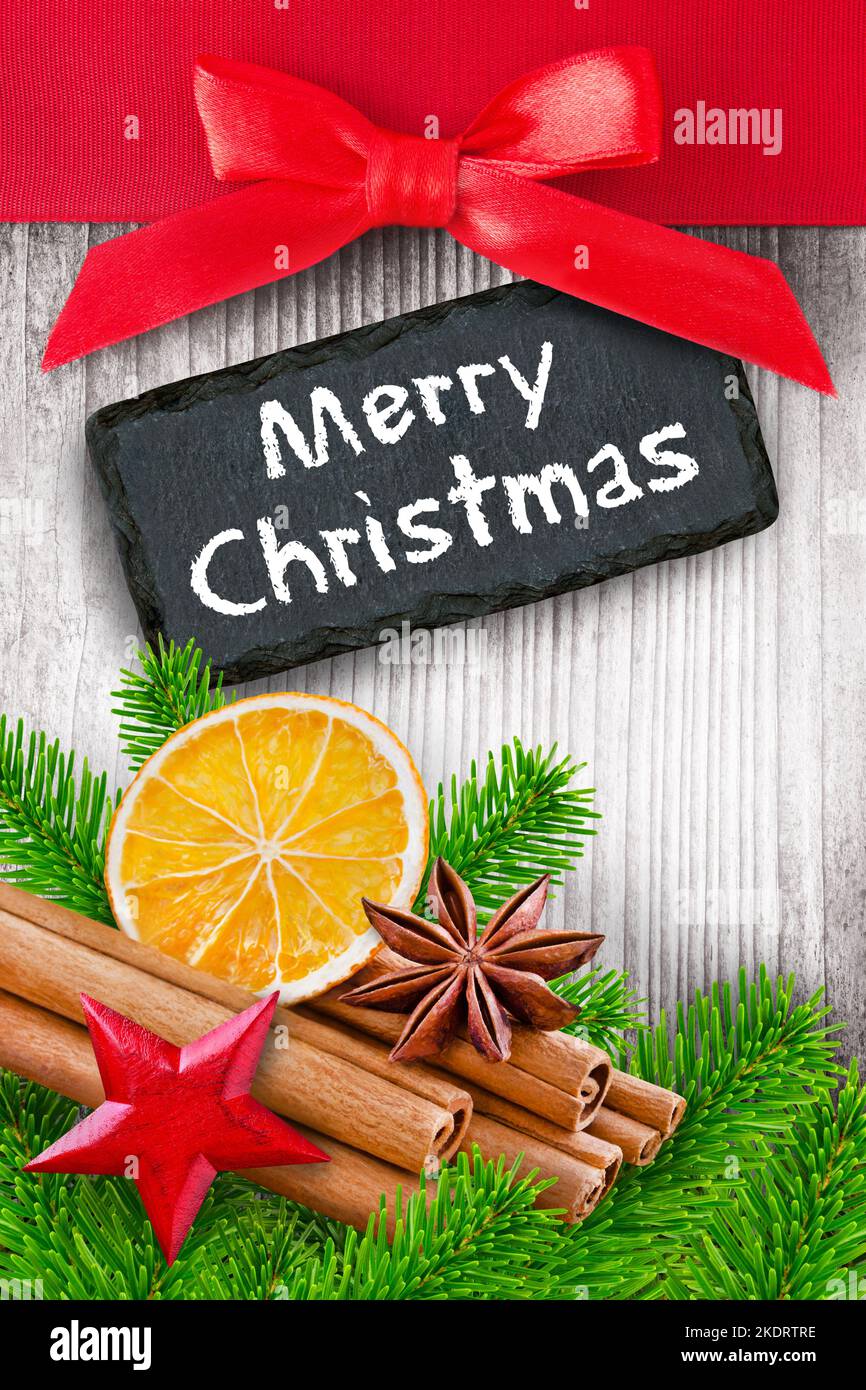 Decoration and Merry Christmas label with stars, cinnamon and fir