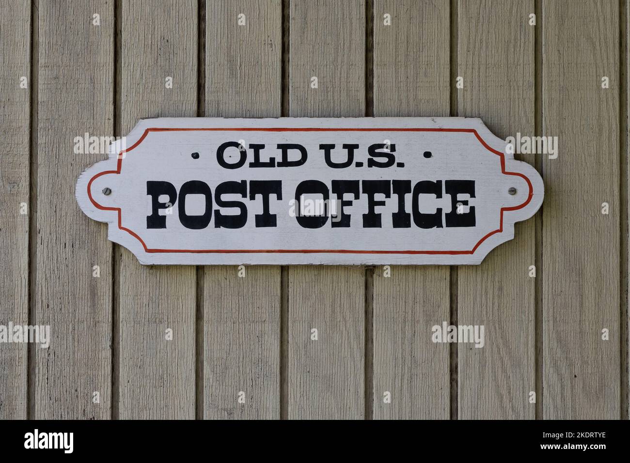 Old US Post-office sign on wooden wall copy-space, centered Stock Photo