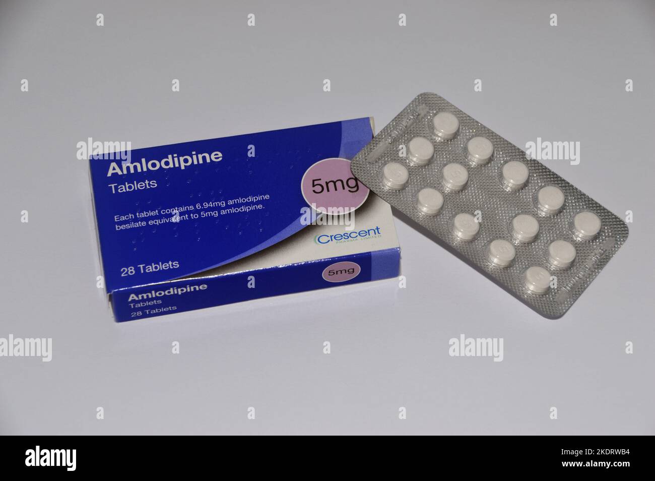 A Box of 28, 5mg Amlodipine Tablets made by Crescent and Prescribed to Treat High Blood Pressure (Hypertension), England, UK. Stock Photo