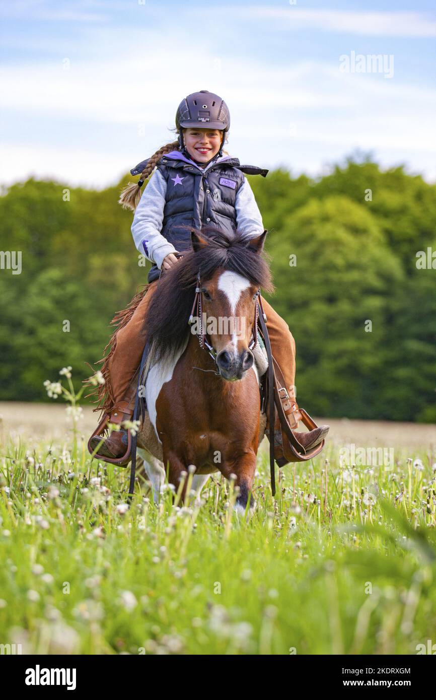 girl rides Horse Stock Photo
