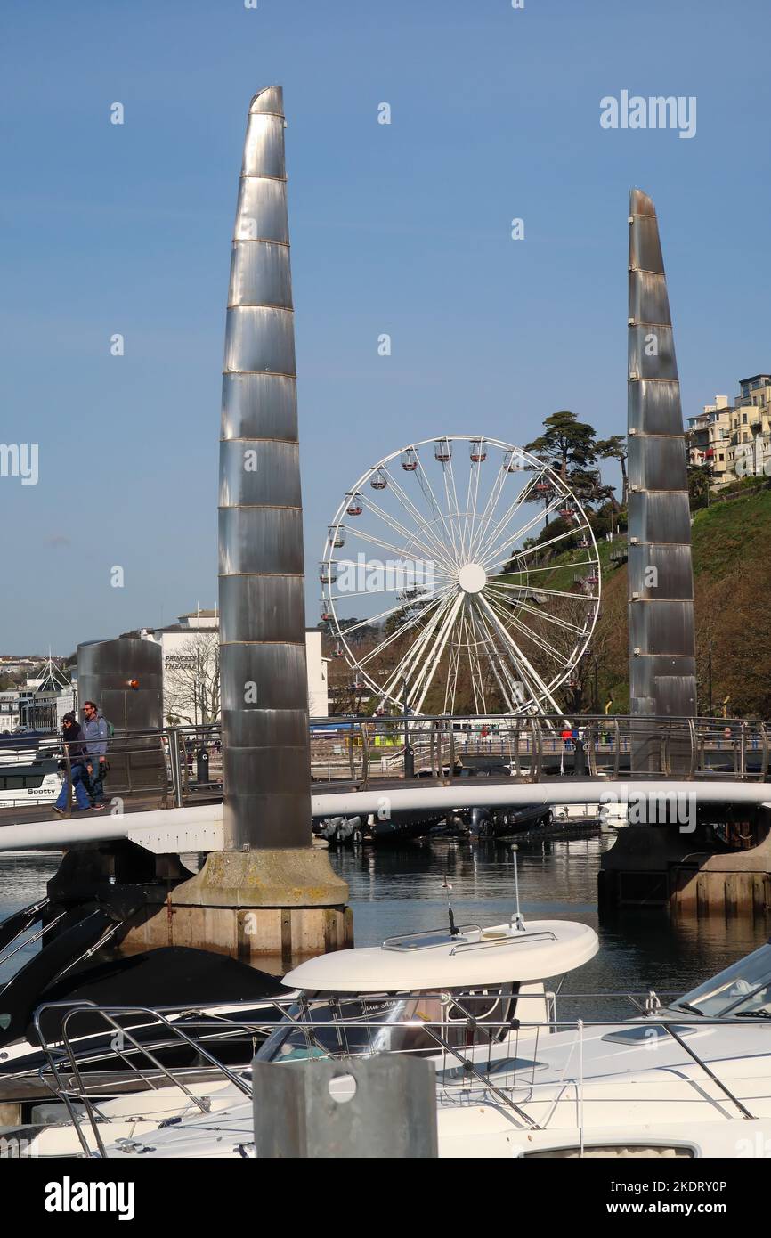 Big Wheel on Torquay seafront, seen between the towers of the Inner