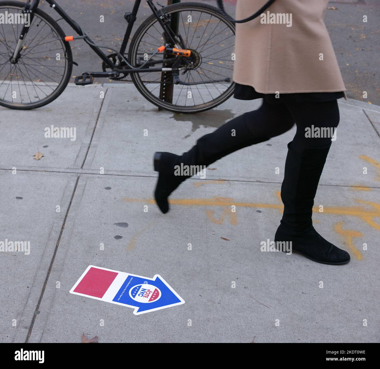 NEW YORK, N.Y. — November 8, 2022: A pedestrian walks near a polling site in Manhattan’s TriBeCa neighborhood on Election Day 2022. Stock Photo