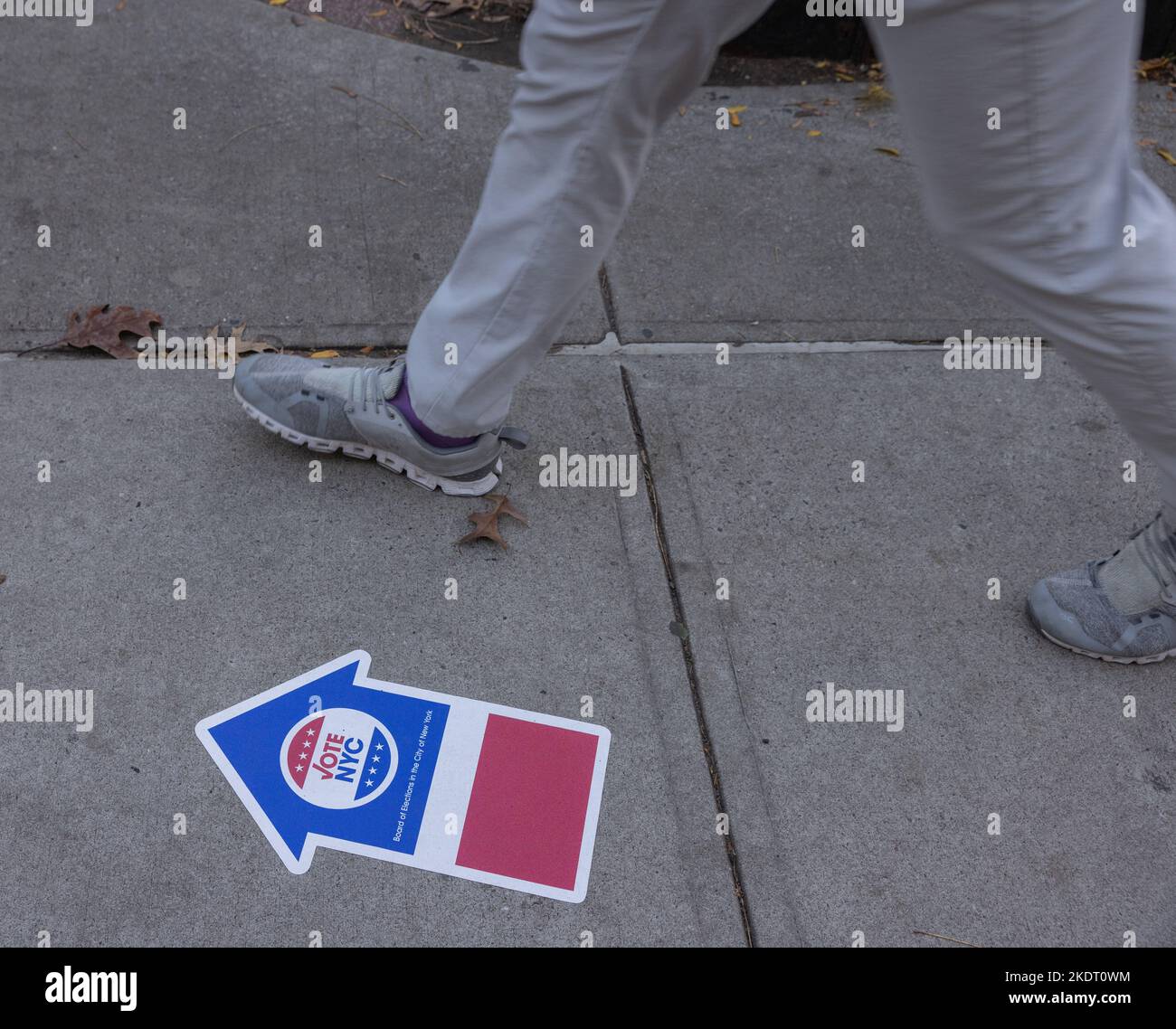 NEW YORK, N.Y. — November 8, 2022: A pedestrian walks near a polling