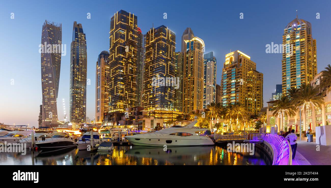 Dubai, United Arab Emirates - May 24, 2021: Dubai Marina Yacht Harbour Skyline Architecture Panorama Vacation By Night Panorama In Dubai, United Arab Stock Photo