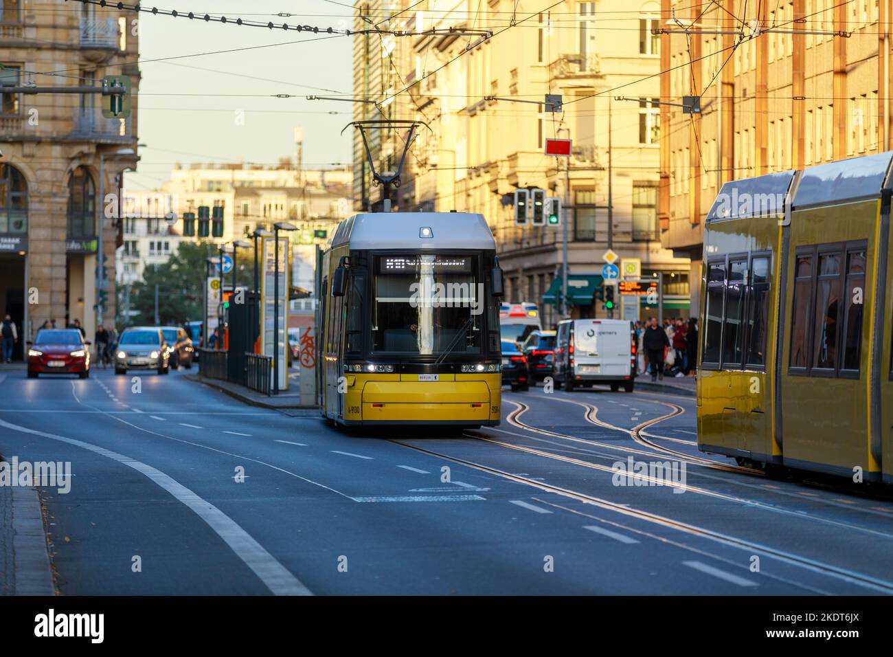 Berlin, Germany - October 7, 2022: Yellow tram drives along a street. The Berlin tramway (German: Straßenbahn Berlin) is the main tram system in Berli Stock Photo