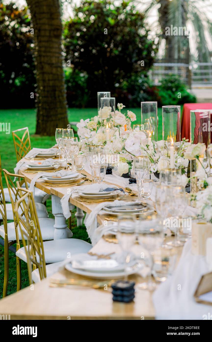 Garden wedding celebration with elegant table setting Stock Photo