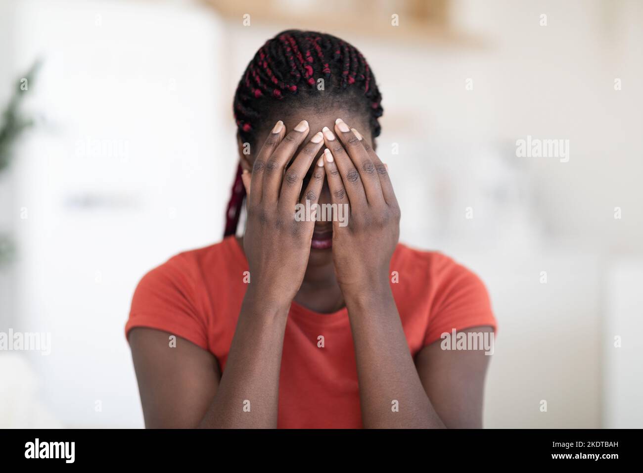 Nervous Breakdown. Closeup Shot Of Young Black Female Crying At Home Stock Photo
