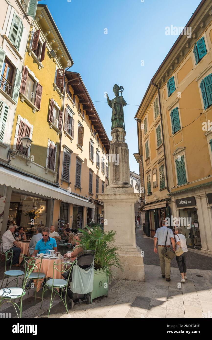 Salo Italy, view in summer of a cafe terrace in Via San Carlo in the center of the scenic Lake Garda town of Salo, Lombardy, Italy Stock Photo