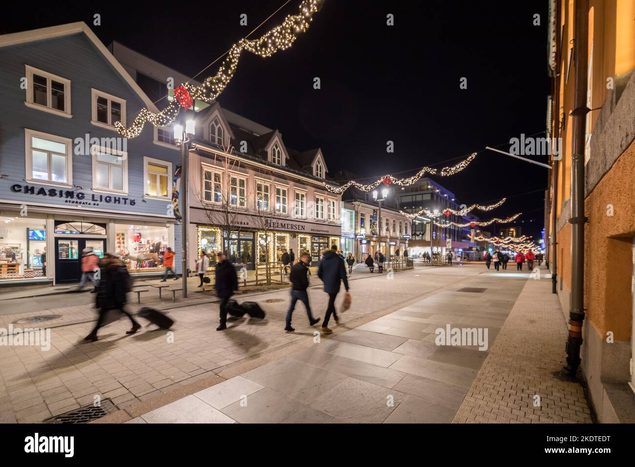 the main shopping street in Tromso, Norway. At night in