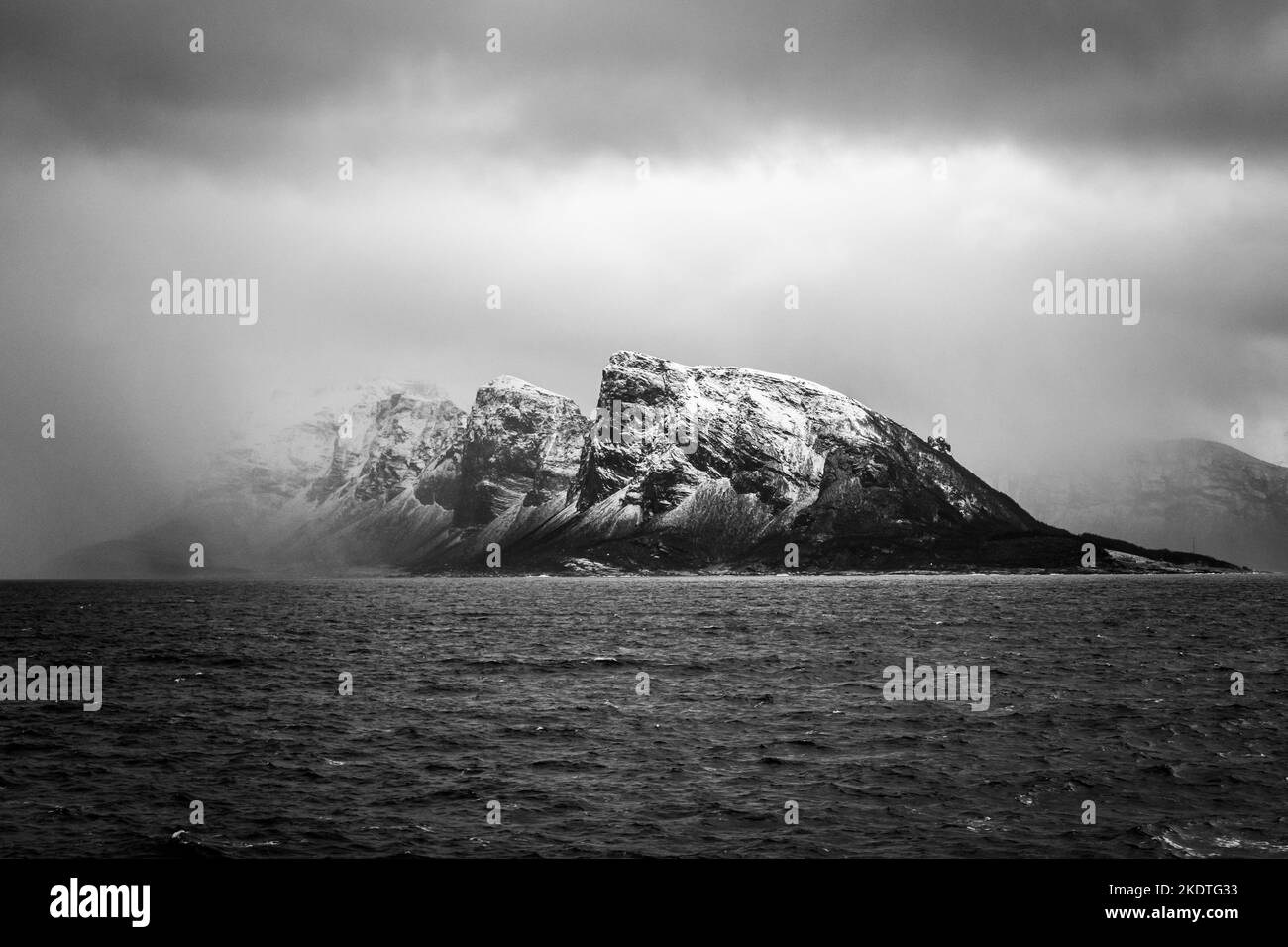 Storm clouds and wintry weather over the impressive Norway fjord landscape.  January 2020. Stock Photo