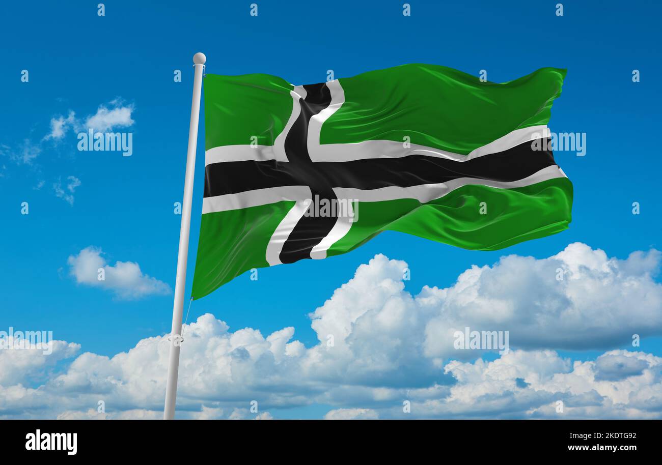 flag of Baltic Finns Forest Finns at cloudy sky background, panoramic view. flag representing ethnic group or culture, regional authorities. copy spac Stock Photo