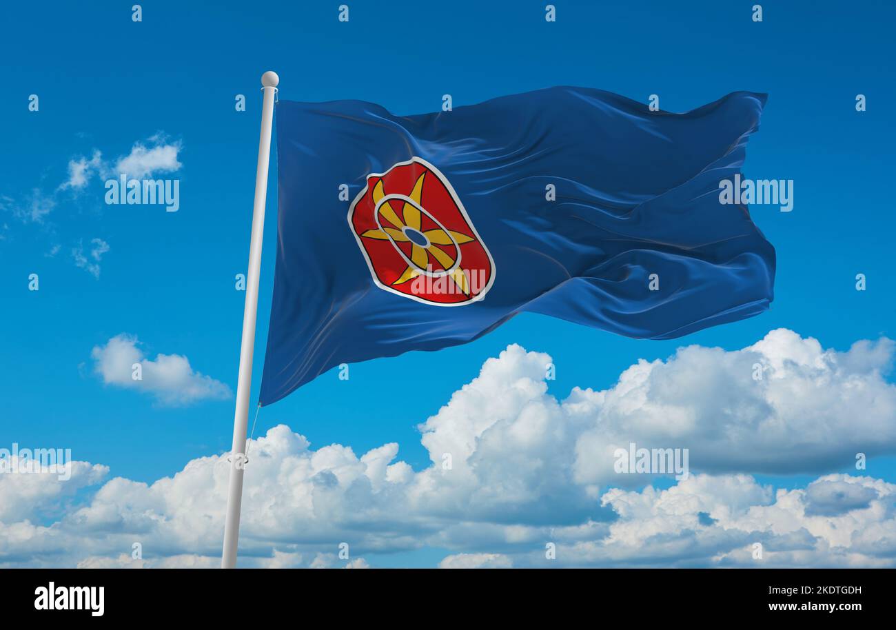 flag of Baltic Finns Kven people at cloudy sky background, panoramic view. flag representing ethnic group or culture, regional authorities. copy space Stock Photo