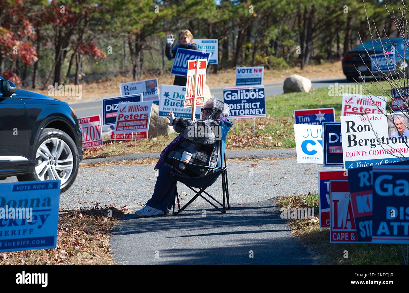 Mid Term Election Day - US -- Sign holding in Barnstable, Massachusetts, USA on Cape Cod Stock Photo