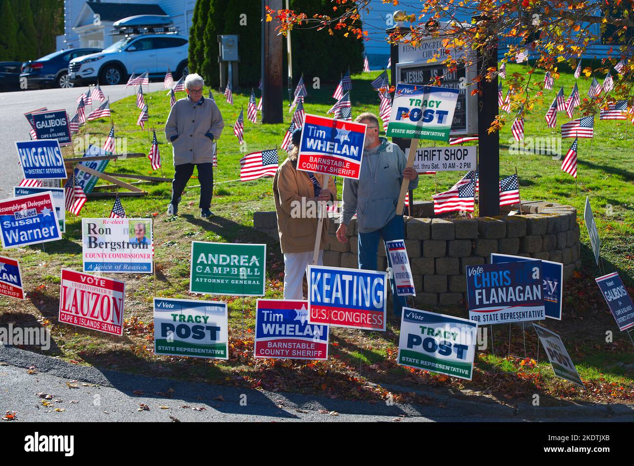 Mid Term Election Day - US -- Sign holding in Yarmouth Port, Massachusetts, USA on Cape Cod Stock Photo
