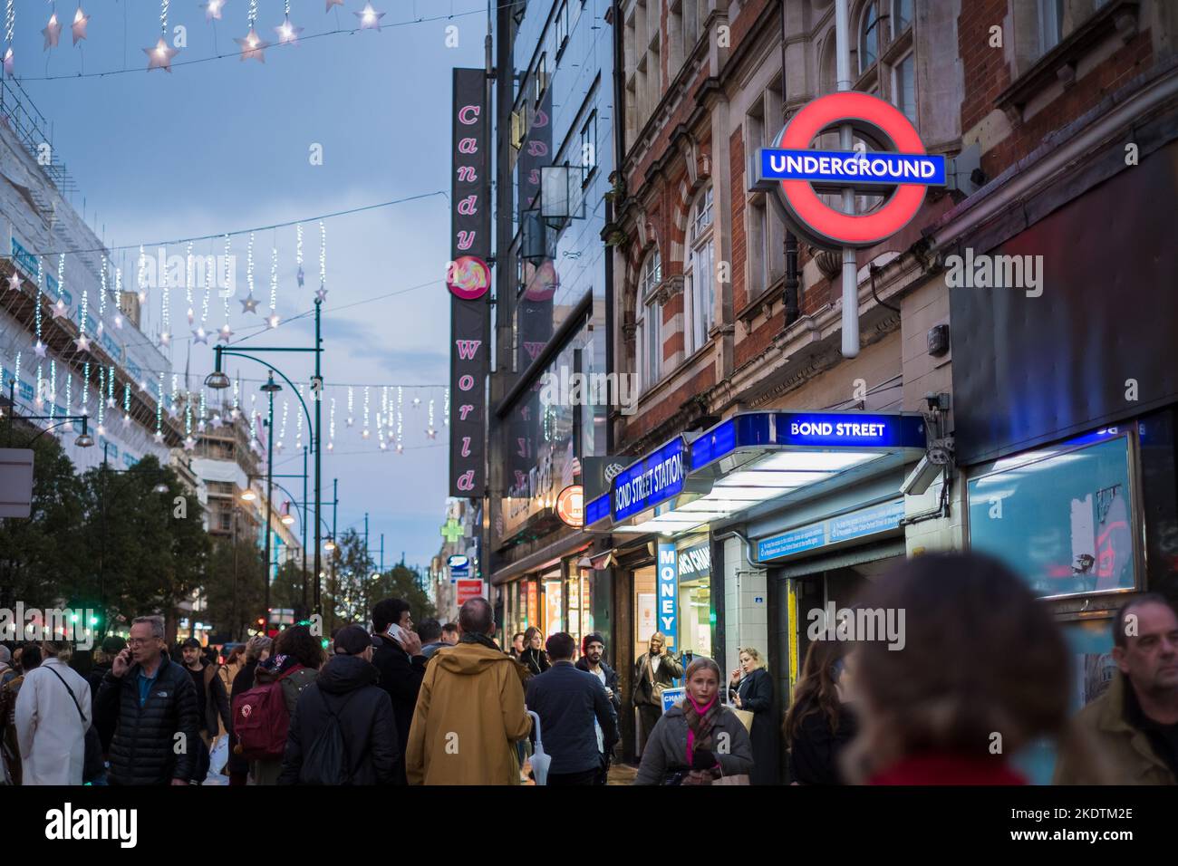 London, UK - November 6, 2022: Candy World shop sign on busy Oxford shopping street. Stock Photo