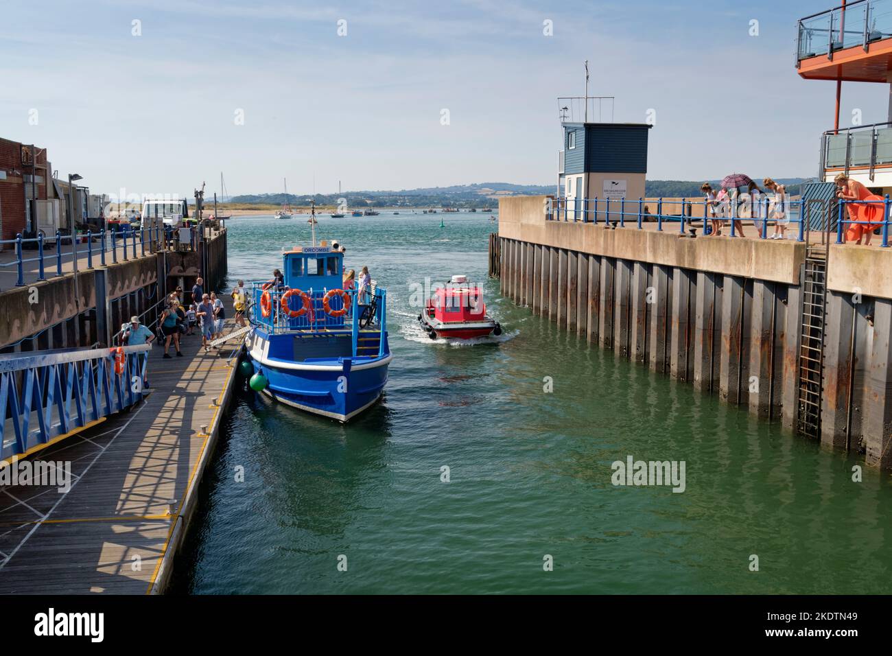 Starcross ferry boat Orcombe moored at Exmouth Landing as passengers get off, Exmouth, Devon, UK, August. Stock Photo