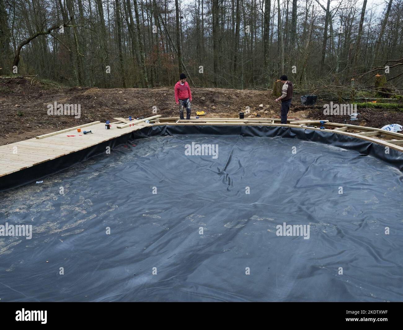 Preparatory work for construction of educational dipping pond with the liner in place, Blashford Lakes Nature Reserve, Hampshire and Isle of Wight Wil Stock Photo