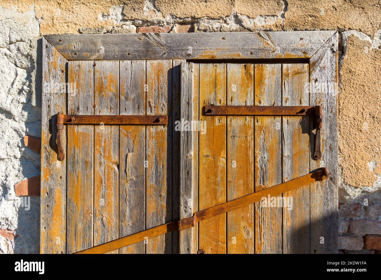 Old wooden door with rusty hinge Stock Photo Alamy
