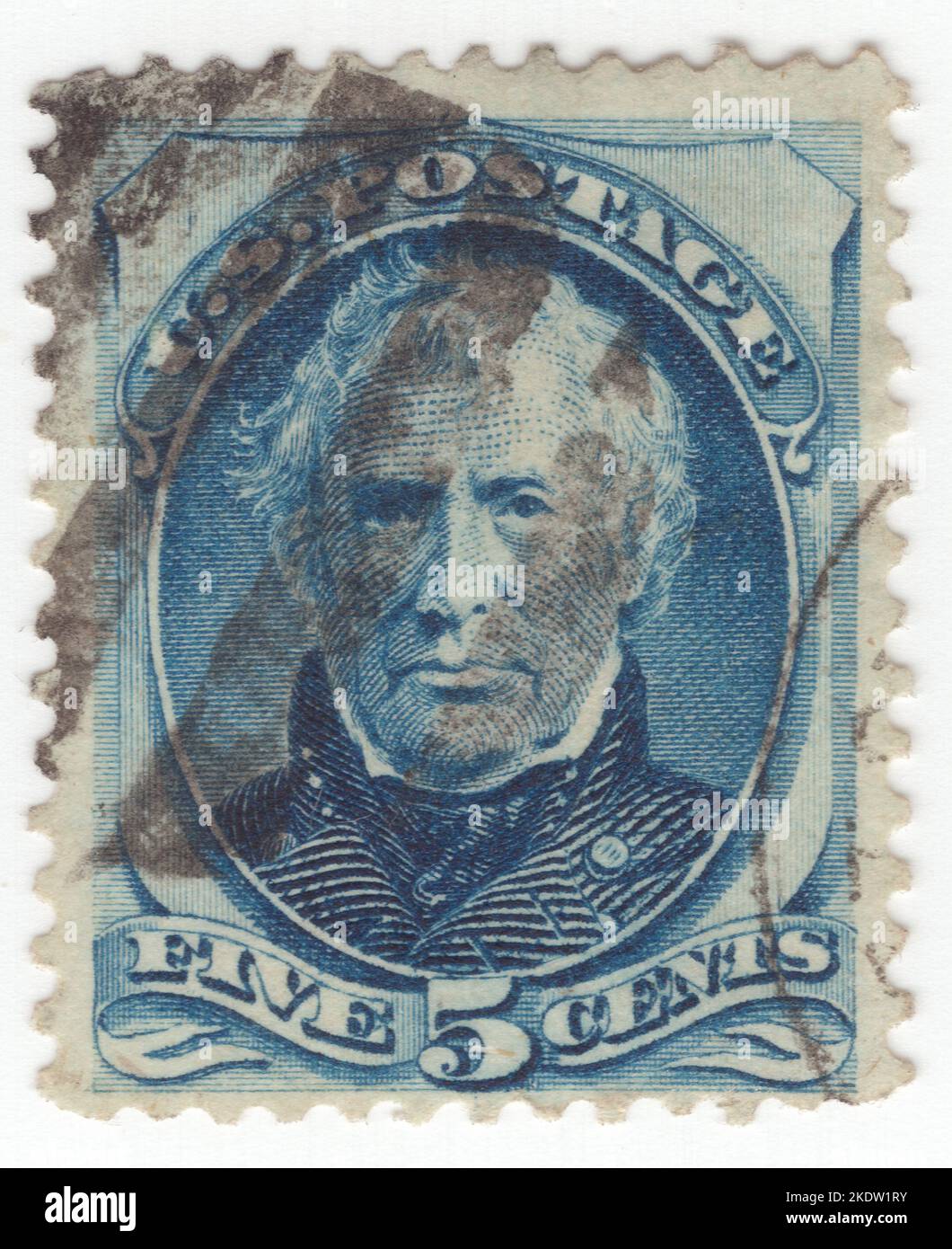 USA - 1879: An 5 cents blue postage stamp depicting portrait of Zachary Taylor, American military leader who served as the 12th president of the United States from 1849 until his death in 1850. Taylor previously was a career officer in the United States Army, rising to the rank of major general and becoming a national hero as a result of his victories in the Mexican–American War. As a result, he won election to the White House despite his vague political beliefs. His top priority as president was preserving the Union. He died 16 months into his term Stock Photo