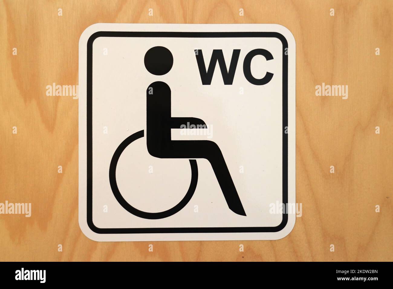 Sign with an icon for a restroom for handicapped people Stock Photo