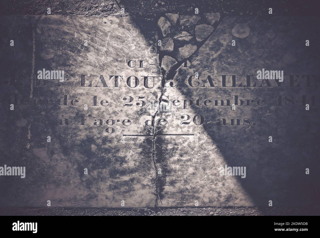 The grave of French settler Jean Baptiste Latour Caillavet is inscribed in French at Old Biloxi Cemetery, Nov. 6, 2022, in Biloxi, Mississippi. Stock Photo