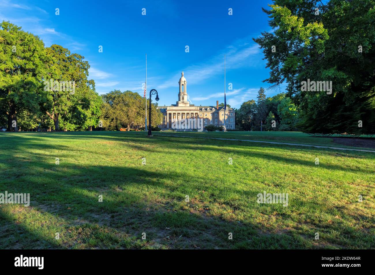 The Old Main building at Sunrise on the campus of Penn State University in State College, Pennsylvania. Stock Photo