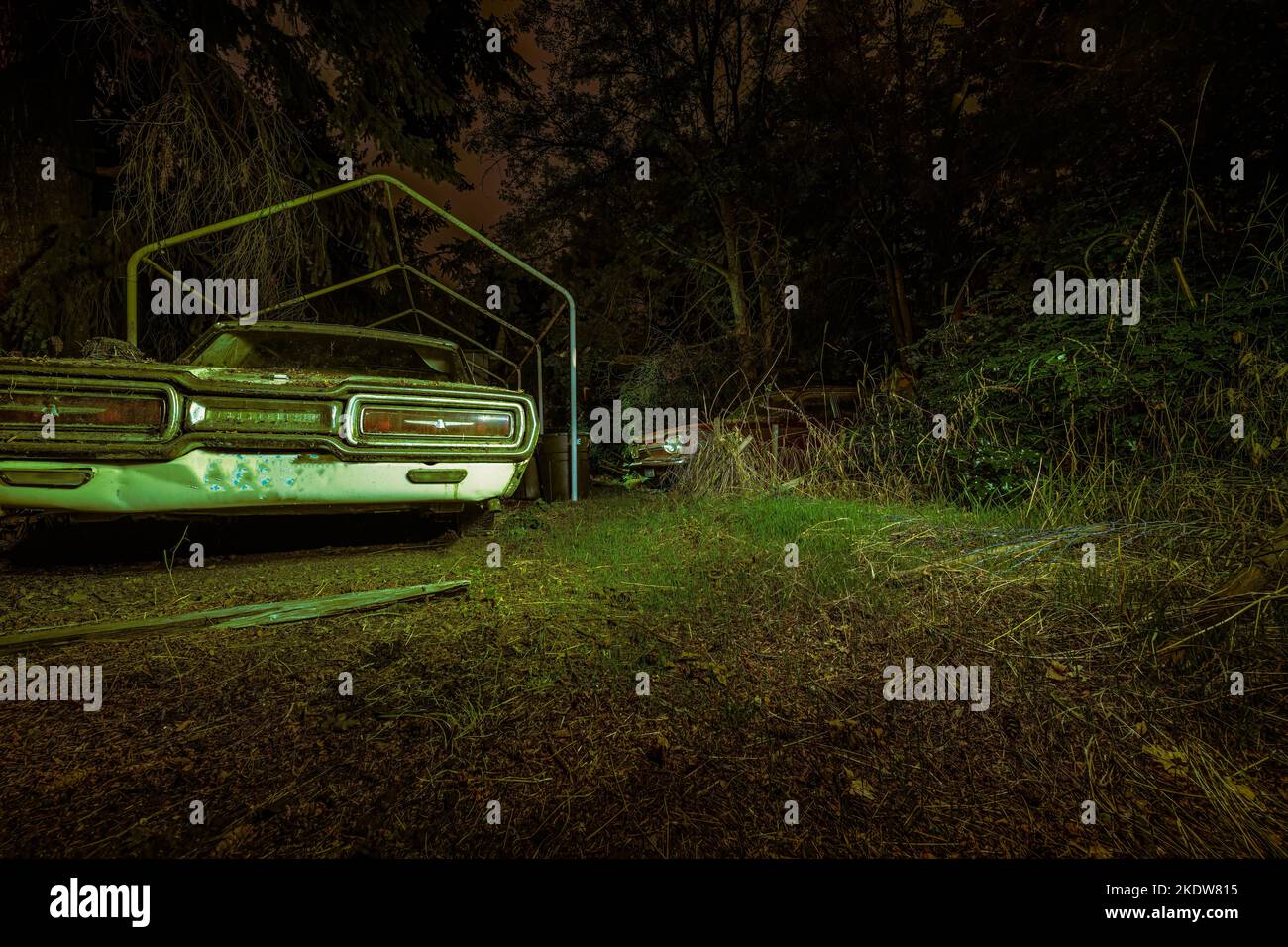 Abandoned Vintage Cars at Night Stock Photo - Alamy