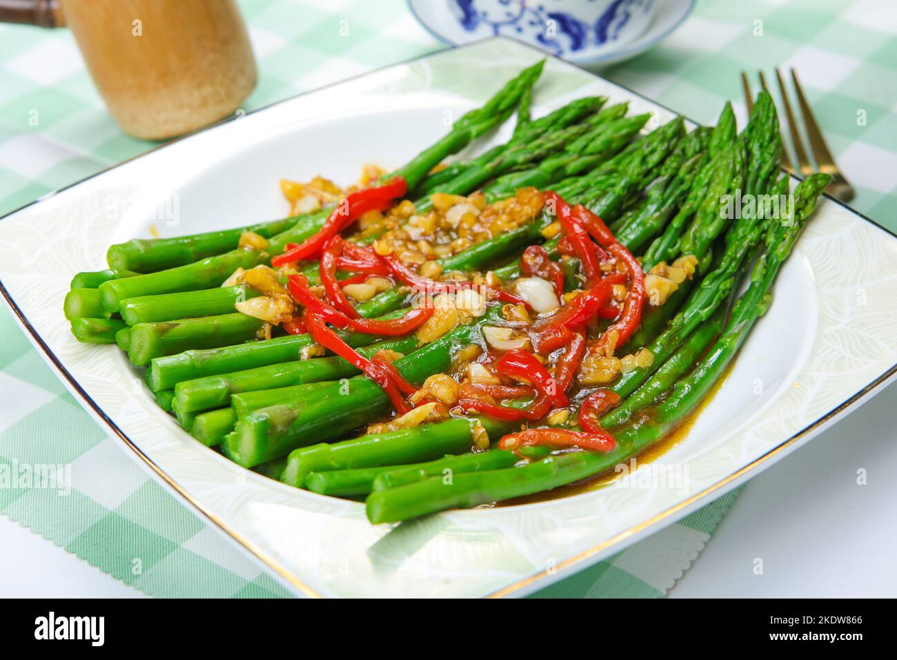 A plate of oil spray asparagus Stock Photo Alamy