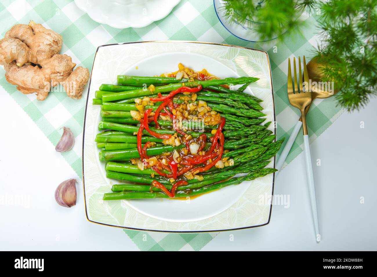 A plate of oil spray asparagus Stock Photo Alamy