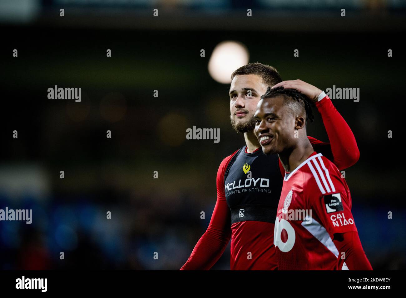 Standard's Nicolas Raskin and Standard's William Balikwisha celebrate