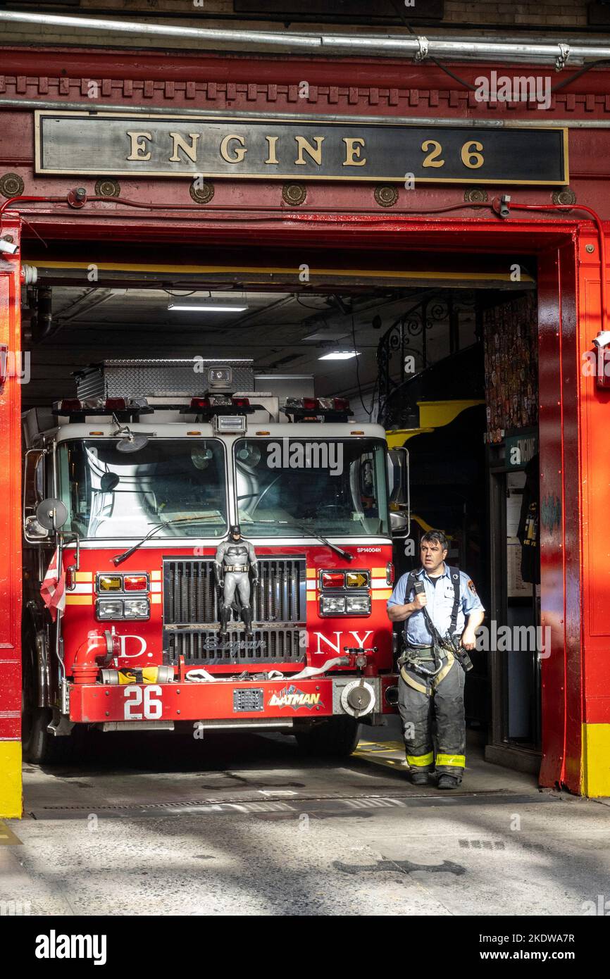Fire engine at engine 28 is backed in to the station after a call by fireman, 2022, NYC, USA Stock Photo