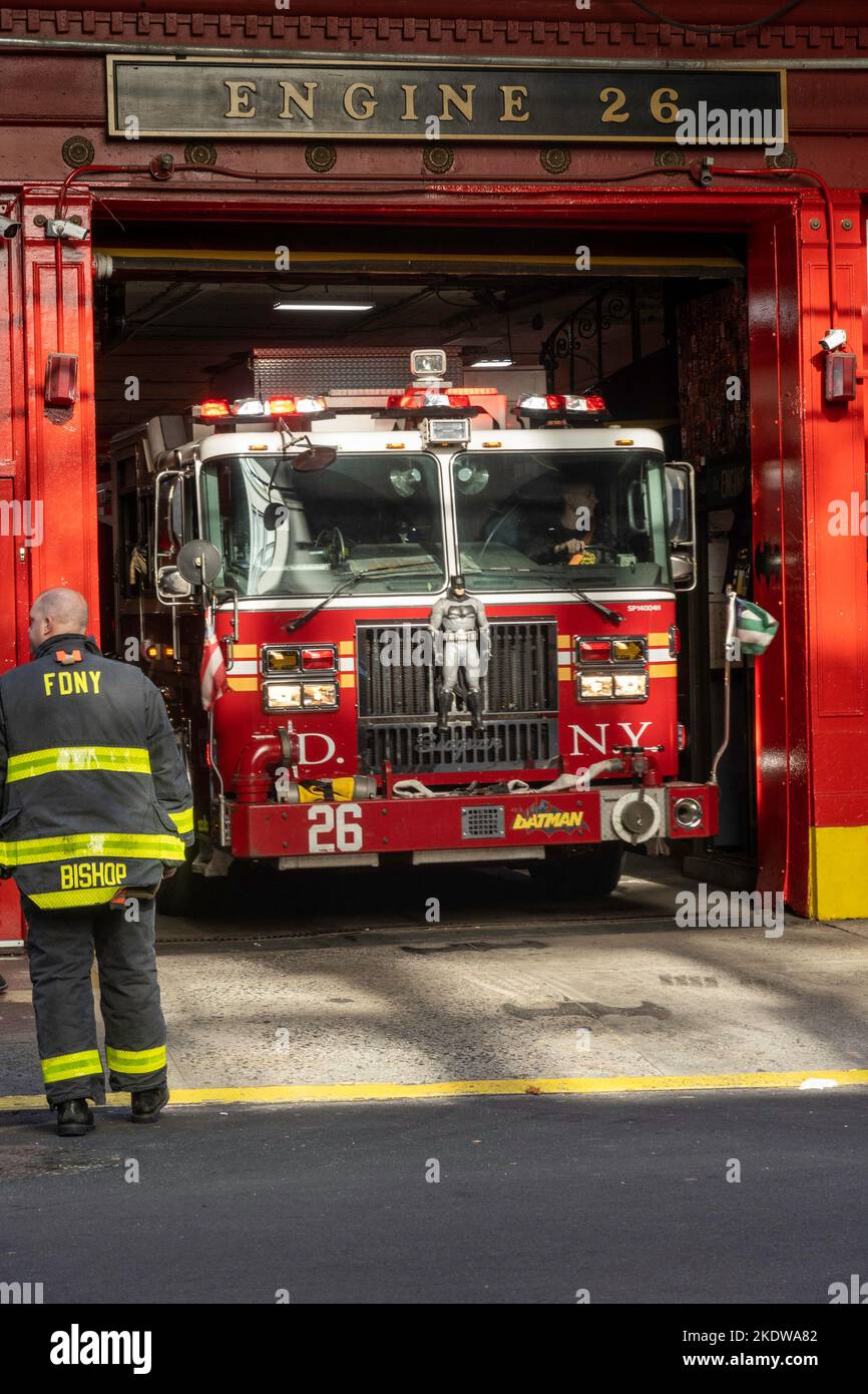 Fire engine at engine 28 is backed in to the station after a call by fireman, 2022, NYC, USA Stock Photo