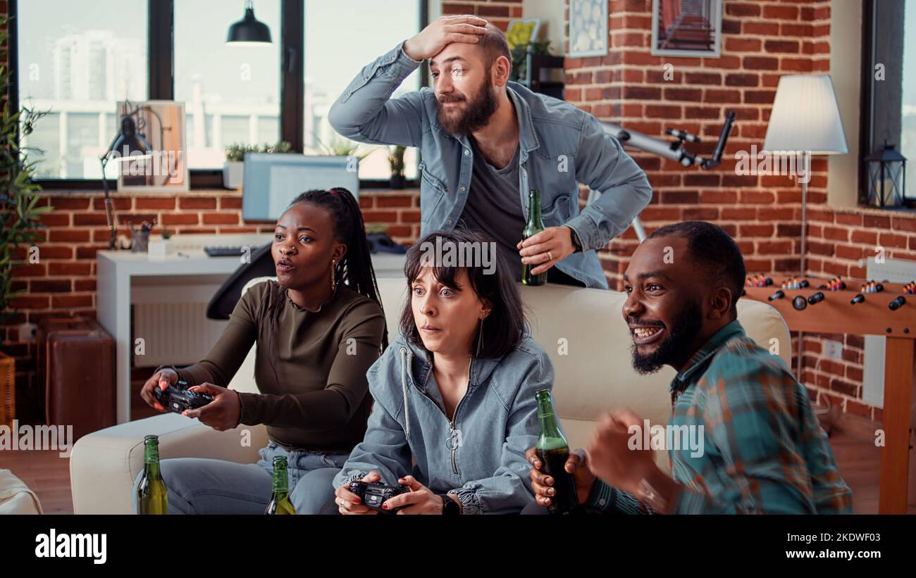 Men Relax By Playing Competitive Video Games As Friends In A Local Internet  Bar That Specializes In Online Gaming Stock Photo, Picture and Royalty Free  Image. Image 81203430.