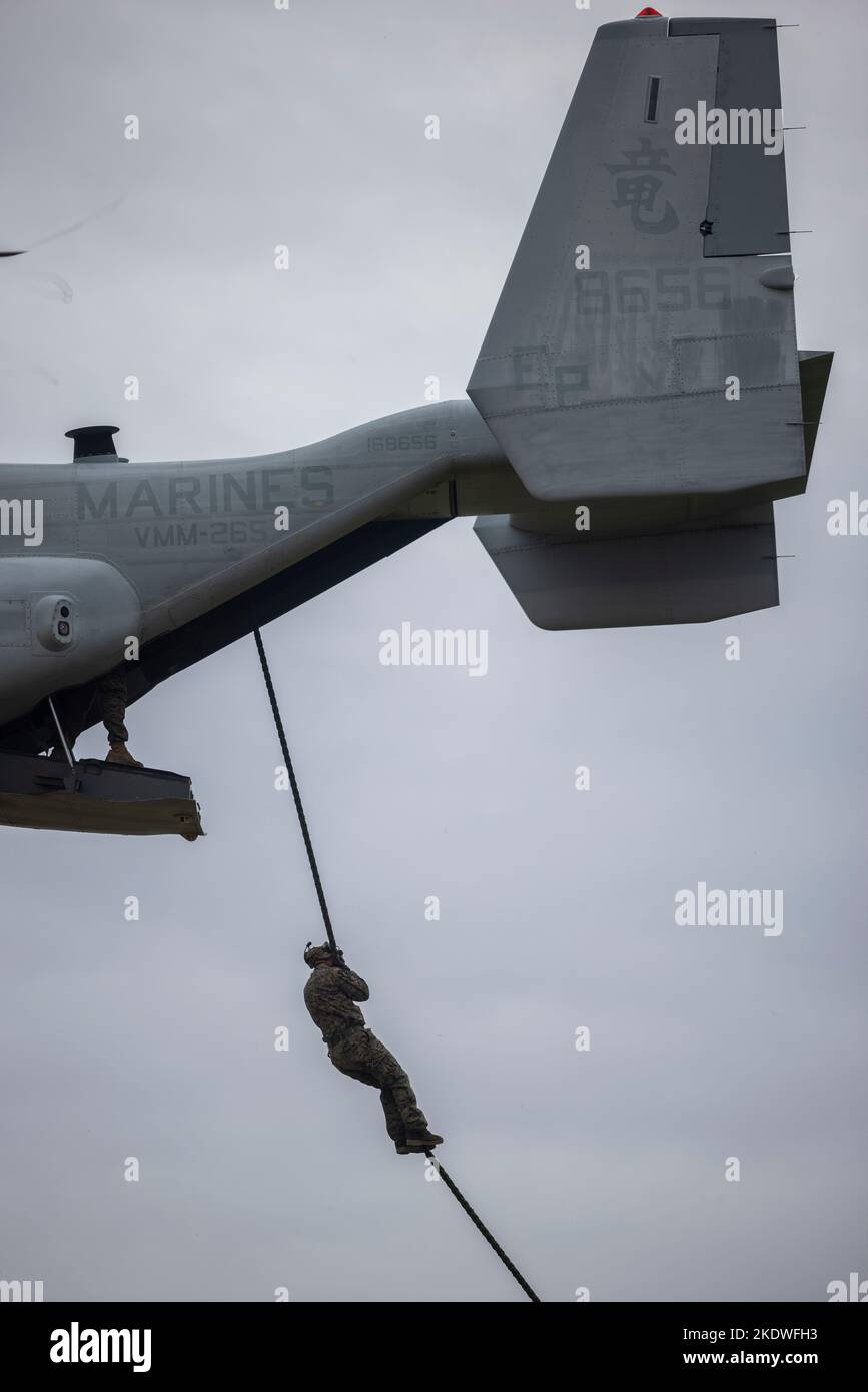 U.S. Marines with III Marine Expeditionary Force (MEF) fast rope from ...