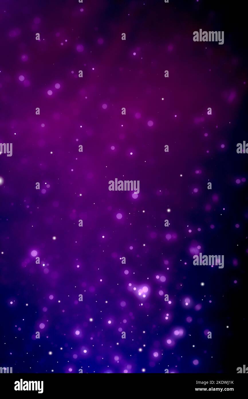 Purple glowing particles background cinematic atmosphere. Glittering sparkling bokeh party overlay with copy space for text. Stock Photo