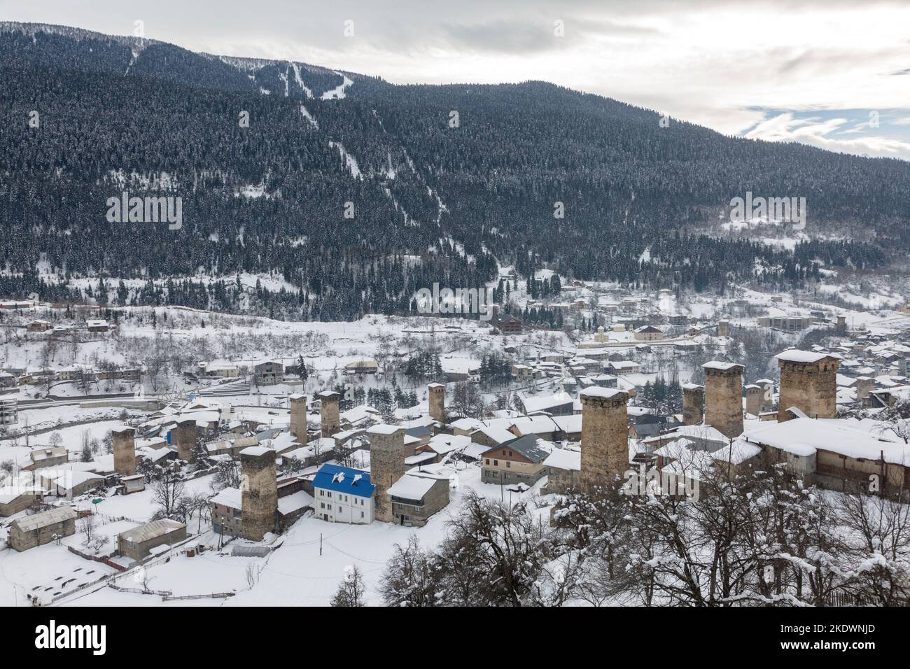 Big Svan Towers in the village of Mestia surrounded by the Caucasus Mountains, Svaneti, Georgia Stock Photo