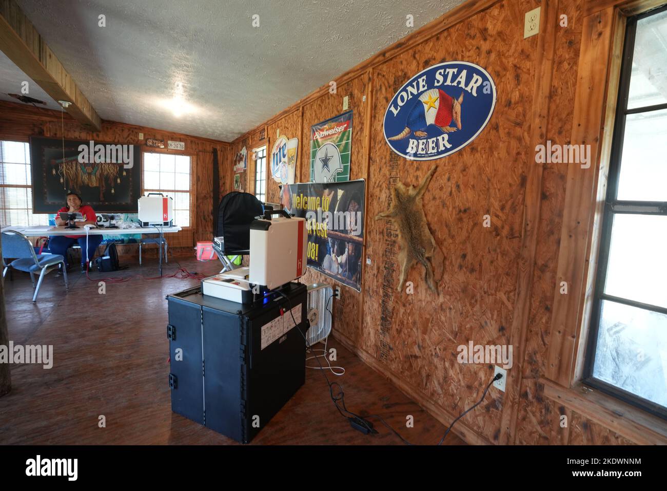 Live Oak County Texas USA, November 8 2022: A poll worker waits in the old barbecue joint Ray's outside of Alice, Texas for voters to arrive during the midterm elections in rural south Texas. The business has been closed about 15 years and is used regularly as a rural polling place. Credit: Bob Daemmrich/Alamy Live News Stock Photo