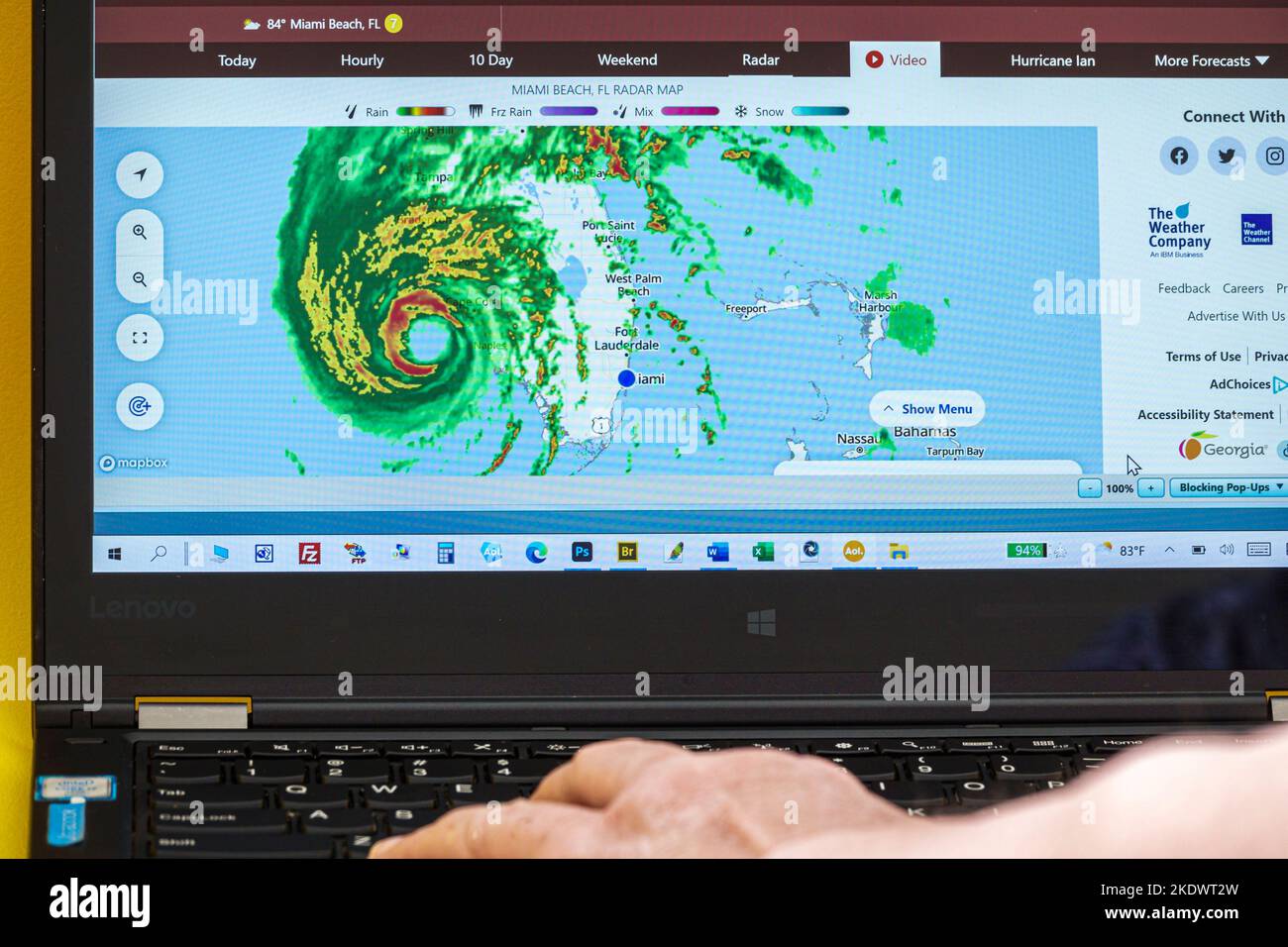 Miami Beach Florida Southwest,laptop computer monitor screen Hurricane Ian category 4,radar eye feeder bands Gulf of Mexico approaching land landfall, Stock Photo