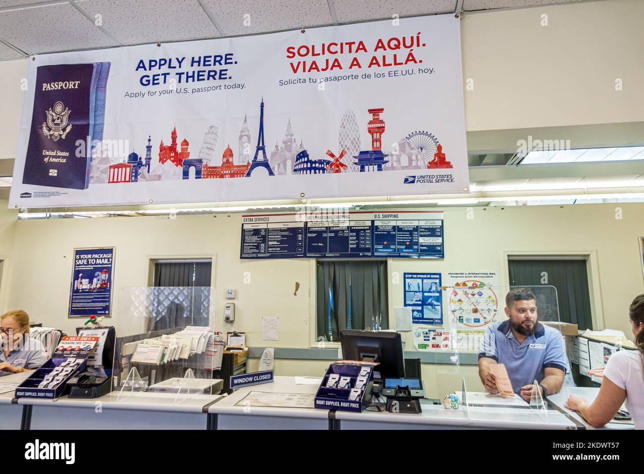 Miami Beach Florida,US post office counter,man men male woman women lady female adult adults,Hispanic Latin Latino ethnic immigrant immigrants minorit Stock Photo