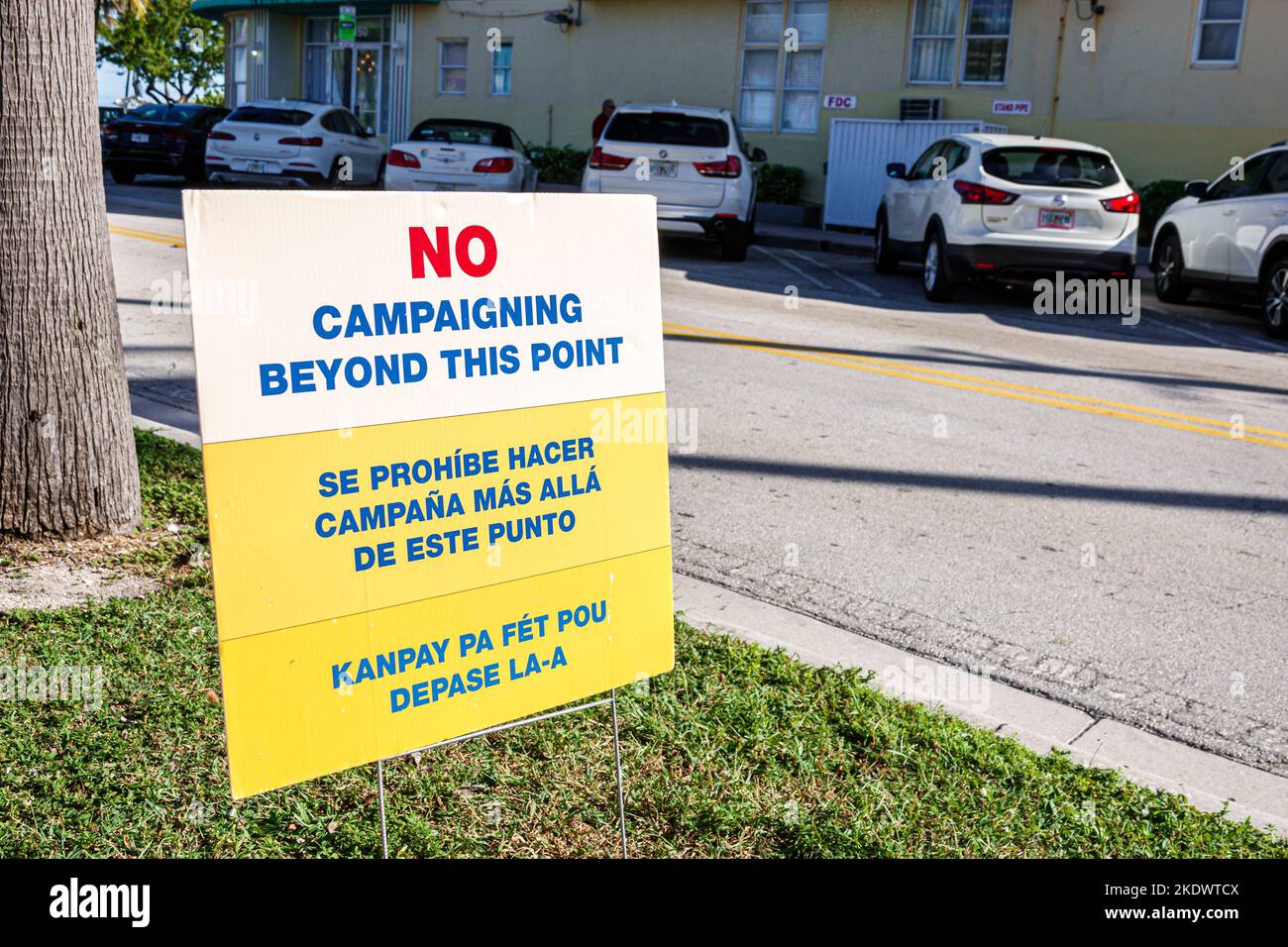 Miami Beach Florida,early voting three 3 languages multiple bilingual multilingual English Spanish Creole,sign no campaigning beyond this point, Stock Photo