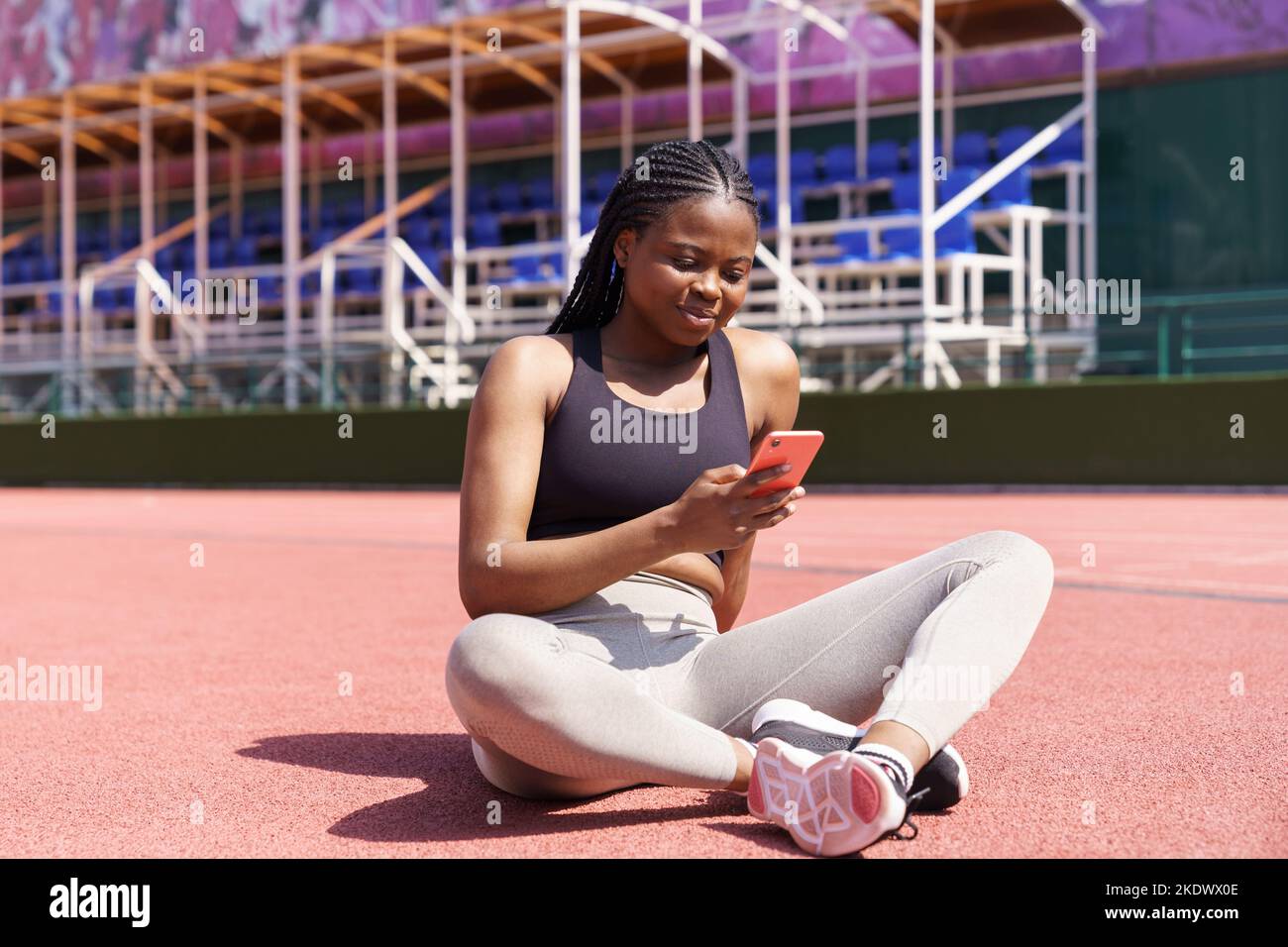 Young black woman chatting on hi-res stock photography and images - Alamy