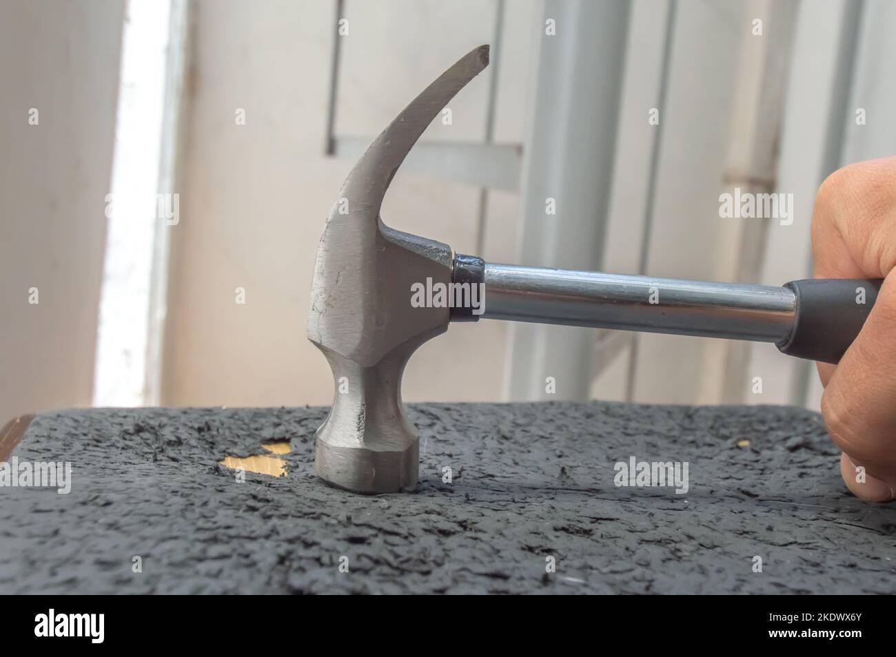 Hammer with black cable, copy space left,maintenance conceptWill Stock