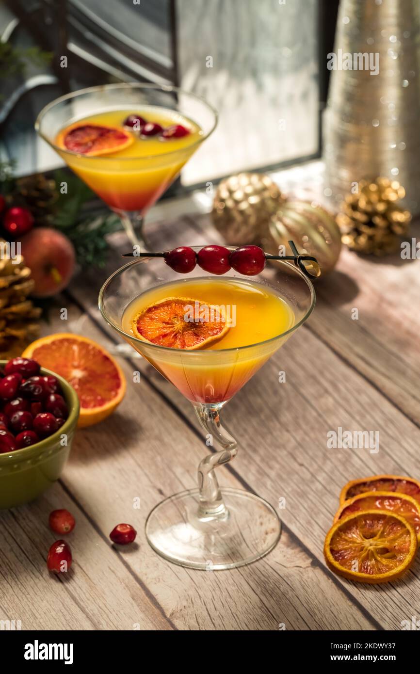 Cranberry orange mimosa cocktails ready for drinking. Stock Photo