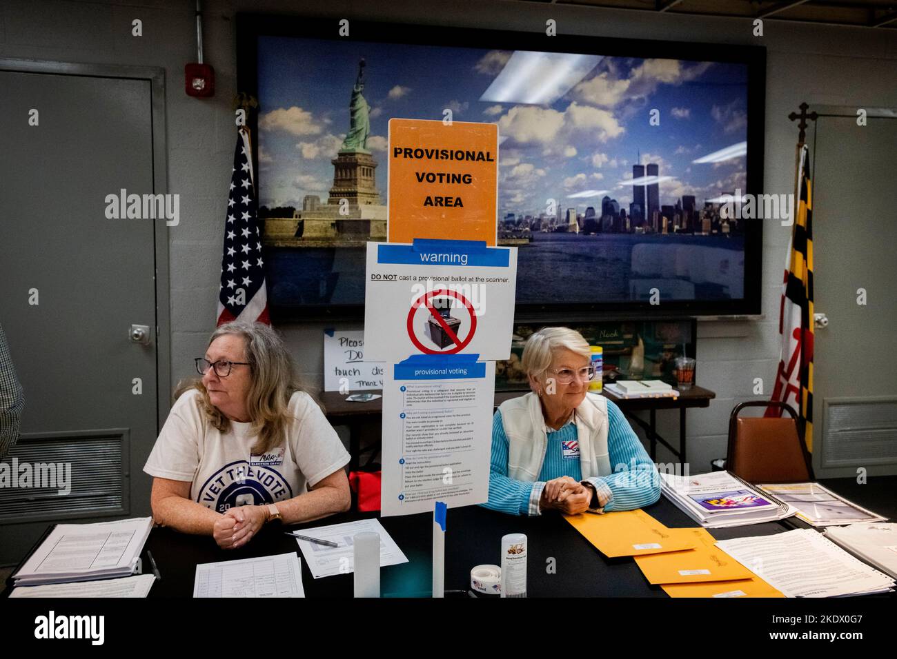 Annapolis, United States Of America. 08th Nov, 2022. As Americans head to the polls to vote in the 2022 Midterm Elections, volunteer election officials Mary Sobray, left, and Sarah Mullikin, right, wait to assist voters at the Eastport Volunteer Fire Company in Annapolis, Maryland, Tuesday, November 8, 2022. Credit: Rod Lamkey/CNP/Sipa USA Credit: Sipa USA/Alamy Live News Stock Photo