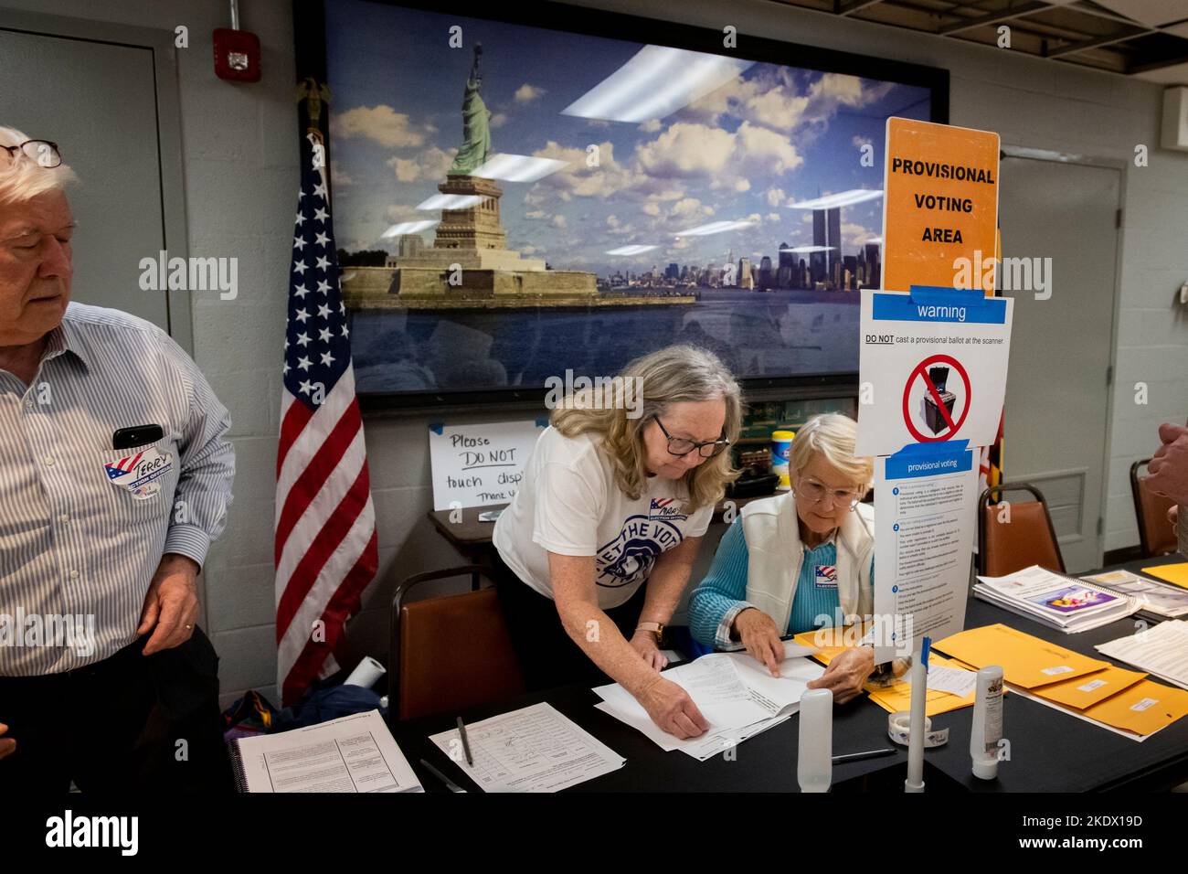 Annapolis, United States Of America. 08th Nov, 2022. As Americans head to the polls to vote in the 2022 Midterm Elections, volunteer election officials Terry Fitzsimmons, left, Mary Sobray, center, and Sarah Mullikin, right, wait to assist voters at the Eastport Volunteer Fire Company in Annapolis, Maryland, Tuesday, November 8, 2022. Credit: Rod Lamkey/CNP/Sipa USA Credit: Sipa USA/Alamy Live News Stock Photo