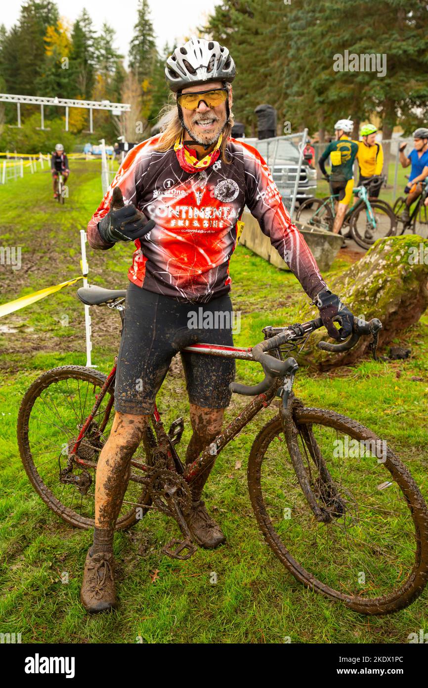 WA21416-00...WASHINGTON - Tom Kirkendall at the finish of a rather muddy cyclocross race in Enumclaw, Washington. Stock Photo