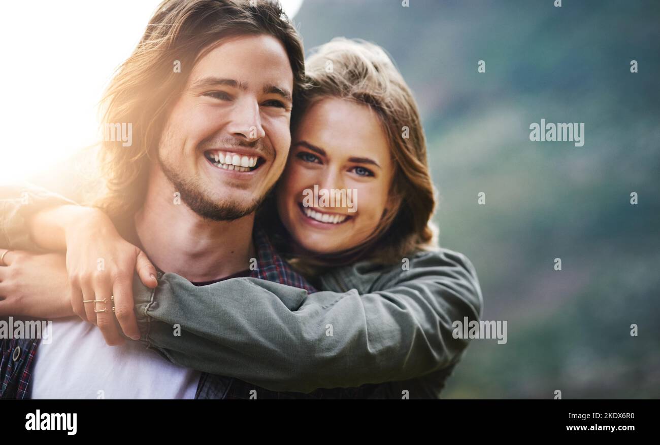 We live for the sunshine. Portrait of a happy young couple having fun outside. Stock Photo