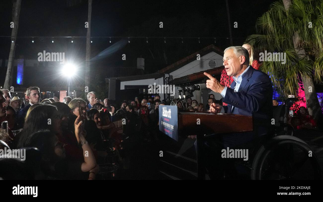 McAllen Texas USA, November 8 2022: Texas Governor GREG ABBOTT, joined onstage by his wife, Cecelia, and daughter, Audrey, revels in a re-election victory over Democratic challenger Beto O'Rourke during an election-night watch party. ©Bob Daemmrich Stock Photo